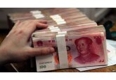 Băncile chinezeşti taie dobânzile la depozite pentru a impulsiona creşterea economică