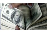 US interest rates set by Federal Reserve rise to their highest since 2007 but the pace of the increase slows