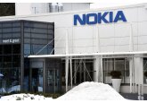 Nokia va desfiinţa până la 14.000 de locuri de muncă din cauza reducerii cererii din SUA. Acţiunile companiei au scăzut cu 5% 
