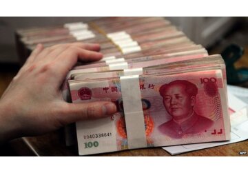 Băncile chinezeşti taie dobânzile la depozite pentru a impulsiona creşterea economică