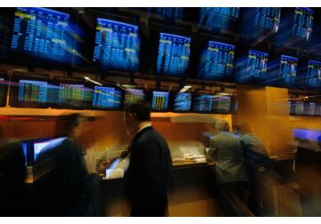 Bursele internaţionale, alimentate de estimările privind stabilizarea creşterilor ratelor dobânzilor. Investitorii mizează pe o majorare cu un sfert de punct procentual din partea Fed în ianuarie.