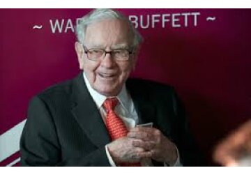 Warren Buffett acumulează numerar şi vinde acţiuni, dar nu explică de ce în scrisoarea sa anuală adresată investitorilor