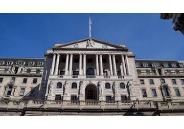 Bank holds interest rates but hints at future cuts