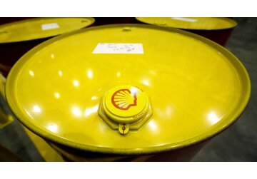 Shell profits cut by half due to plunging energy prices