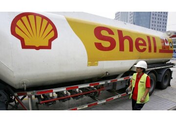 Shell reports lower profits as energy prices cool